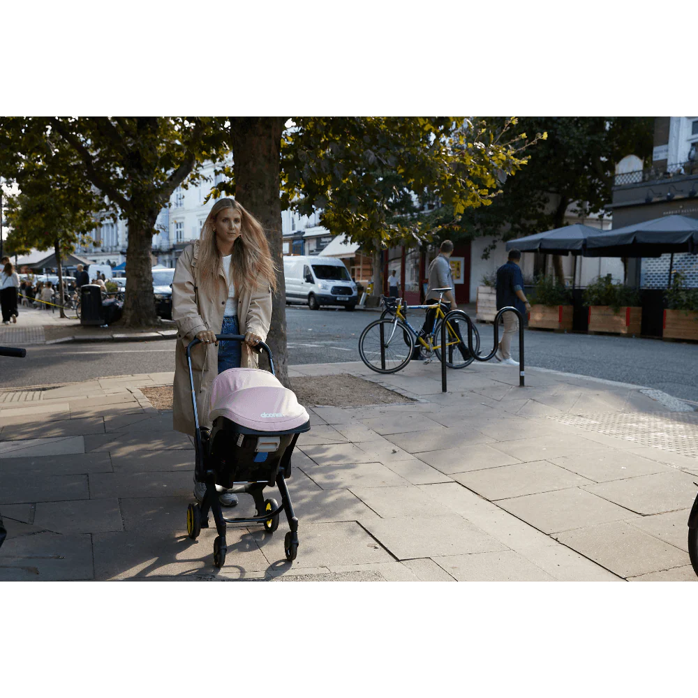 Doona+ Baby Car Seat & Travel Stroller - Convertible Infant Car Seat, Carry Cot and Pram with 5 Point Safety Harness, Ergonomic Pushchair and Travel System (ISOFIX Base Sold Separately)- Blush Pink