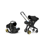 Doona+ Baby Car Seat & Travel Stroller - Convertible Infant Car Seat, Carry Cot and Pram with 5 Point Safety Harness, Ergonomic Pushchair and Travel System (ISOFIX Base Sold Separately)- black