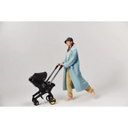 Doona+ Baby Car Seat & Travel Stroller - Convertible Infant Car Seat, Carry Cot and Pram with 5 Point Safety Harness, Ergonomic Pushchair and Travel System (ISOFIX Base Sold Separately)- black