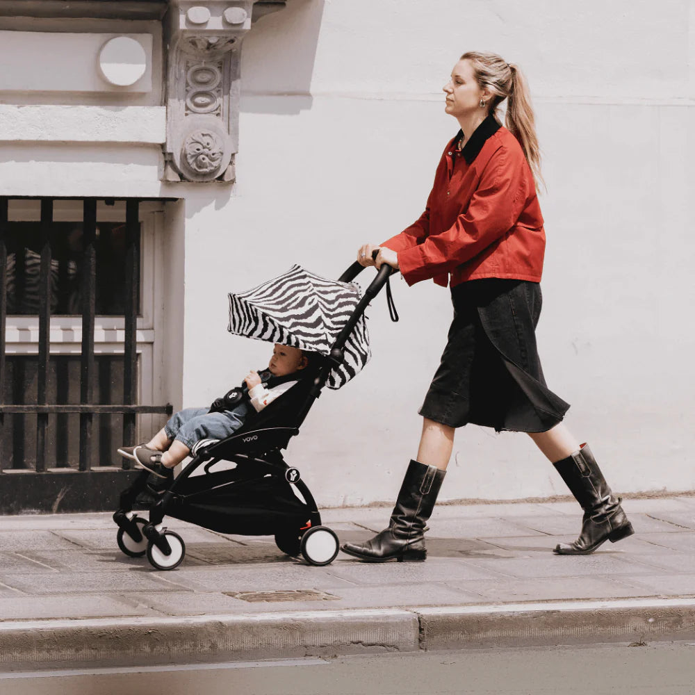 Stokke YOYO³ Stroller – Black Frame & 6 Months+ Color Pack – Lightweight, Compact, Foldable & Travel Friendly Stoller with Padded Seat & Canopy with Viewing Window, UPF 50 Months+ Sun Protection, Stroller for Babies from 6 Months to 4 Years-Zebra