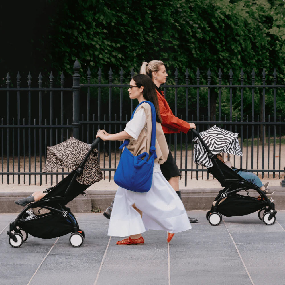 Stokke YOYO³ Stroller – Black Frame & 6 Months+ Color Pack – Lightweight, Compact, Foldable & Travel Friendly Stoller with Padded Seat & Canopy with Viewing Window, UPF 50 Months+ Sun Protection, Stroller for Babies from 6 Months to 4 Years-Zebra
